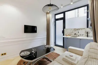 Télévision ou salle de divertissement dans l'établissement Charming apartment - 1BR 4P - Center of Paris