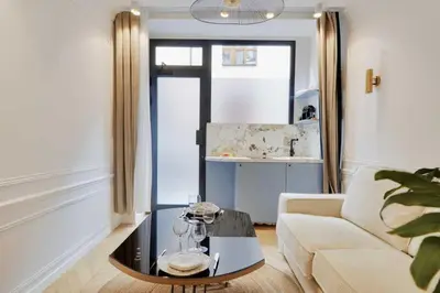 Coin salon dans l'établissement Charming apartment - 1BR 4P - Center of Paris