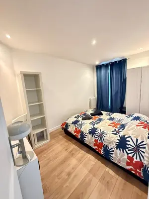 Un ou plusieurs lits dans un hébergement de l'établissement Modern Bright 2 bedroom Apartment Paris 17