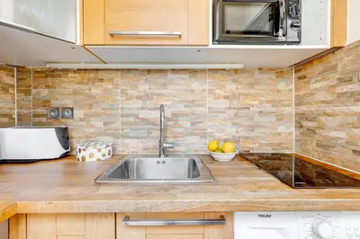 Cuisine ou kitchenette dans l'établissement Le Marais - Pont Marie - Paris Vacation Rentals