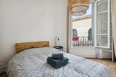 Un ou plusieurs lits dans un hébergement de l'établissement Duplex à Saint-Ouen – Aux portes de Paris