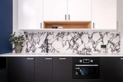 Cuisine ou kitchenette dans l'établissement Studio avec climatisation au coeur du Marais