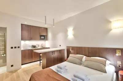 Un ou plusieurs lits dans un hébergement de l'établissement Sublime refurbished studio