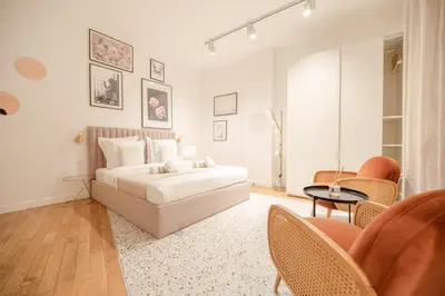 Un ou plusieurs lits dans un hébergement de l'établissement Marais Paris Appartement familial 2 chambres