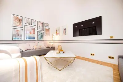 Télévision ou salle de divertissement dans l'établissement Marais Paris Appartement familial 2 chambres