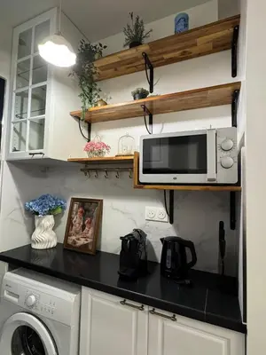 Cuisine ou kitchenette dans l'établissement Elegant Parisian Flat near Eiffel Tower