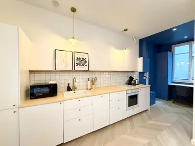 Cuisine ou kitchenette dans l'établissement L Escapade du 9ᵉ Appartement élégant et confortable au cœur de Paris