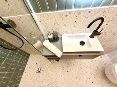 Salle de bains dans l'établissement L Escapade du 9ᵉ Appartement élégant et confortable au cœur de Paris