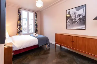 Un ou plusieurs lits dans un hébergement de l'établissement Superb flat with terrace in the centre of Paris