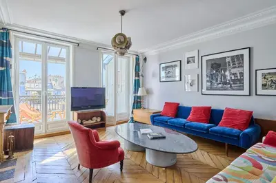 Télévision ou salle de divertissement dans l'établissement Superb flat with terrace in the centre of Paris