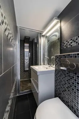 Salle de bains dans l'établissement Appartement Cosy metro saint paul - 4P - Paris 4