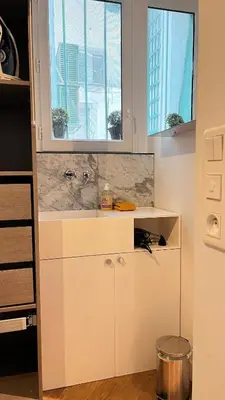 Cuisine ou kitchenette dans l'établissement Appartement élégant à cœur de Paris 2ème