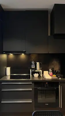 Cuisine ou kitchenette dans l'établissement Appartement élégant à cœur de Paris 2ème