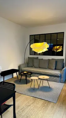 Coin salon dans l'établissement Appartement élégant à cœur de Paris 2ème