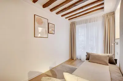 Un ou plusieurs lits dans un hébergement de l'établissement Modern apartment - 3BR 8P - Le Marais Bastille