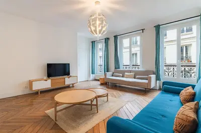 Coin salon dans l'établissement Elegant Apartment in the Heart of Historic Paris