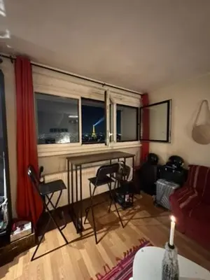Coin salon dans l'établissement Eiffel Tower view & Swimming Pool, Cosy appartment - Center