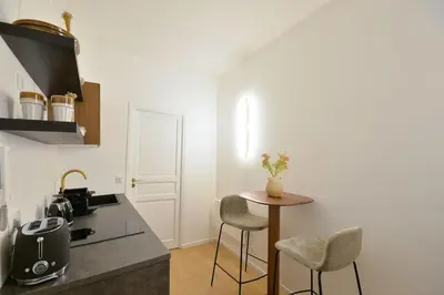 Cuisine ou kitchenette dans l'établissement Bright and Central Studio - Paris