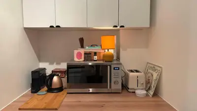Cuisine ou kitchenette dans l'établissement Un appart chaleureux et simple au cœur du 5e arrondissement