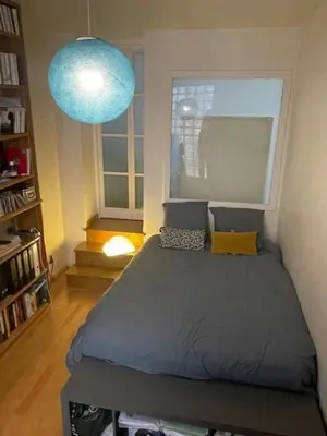 Un ou plusieurs lits dans un hébergement de l'établissement Apartment on Butte aux Cailles