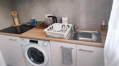 Cuisine ou kitchenette dans l'établissement Appartement F2 de 40m2 pour 4 personnes avec Parking, métro à 4 minutes - ligne 4 Station Lucie Aubrac