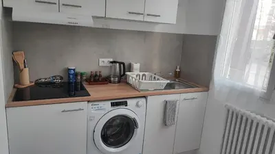 Cuisine ou kitchenette dans l'établissement Appartement F2 de 40m2 pour 4 personnes avec Parking, métro à 4 minutes - ligne 4 Station Lucie Aubrac