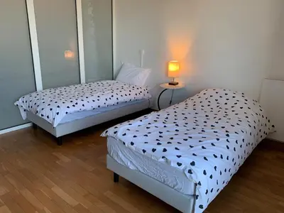 Un ou plusieurs lits dans un hébergement de l'établissement Charming studio Eiffel Tower view