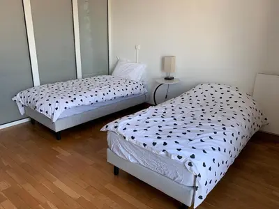 Un ou plusieurs lits dans un hébergement de l'établissement Charming studio Eiffel Tower view