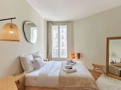 Un ou plusieurs lits dans un hébergement de l'établissement Superb Apartment Center of Paris Le Marais