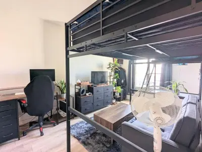 Télévision ou salle de divertissement dans l'établissement Beau studio confortable