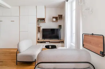 Télévision ou salle de divertissement dans l'établissement Sublime appartement Marais