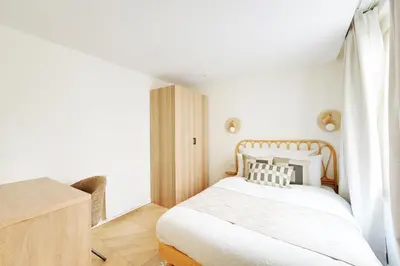 Un ou plusieurs lits dans un hébergement de l'établissement Sublime appartement à deux pas de Bastille