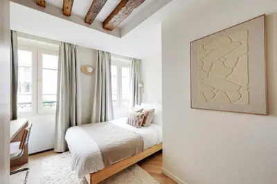 Un ou plusieurs lits dans un hébergement de l'établissement Sublime appartement à deux pas de Bastille
