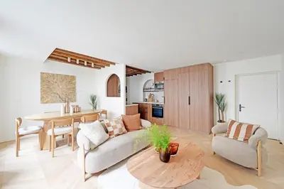 Coin salon dans l'établissement Sublime appartement à deux pas de Bastille
