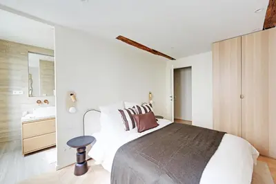 Un ou plusieurs lits dans un hébergement de l'établissement Sublime appartement à deux pas de Bastille