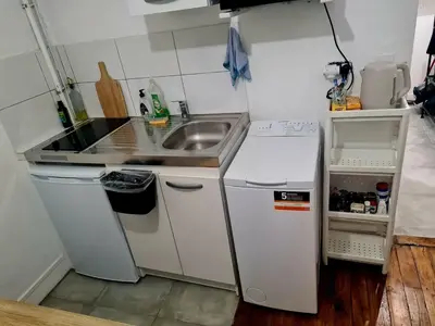 Cuisine ou kitchenette dans l'établissement apartment in the heart of Paris, near to Bastille