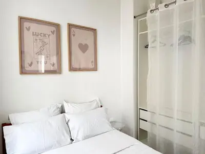 Un ou plusieurs lits dans un hébergement de l'établissement Charming Parisian apartment Paris 2 Central