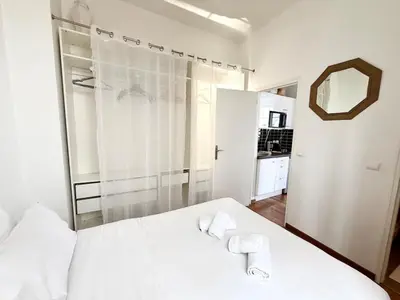 Un ou plusieurs lits dans un hébergement de l'établissement Charming Parisian apartment Paris 2 Central