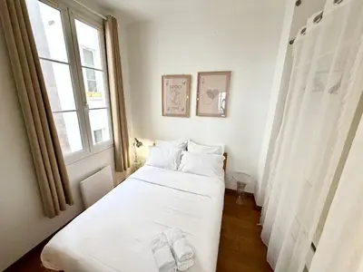 Un ou plusieurs lits dans un hébergement de l'établissement Charming Parisian apartment Paris 2 Central