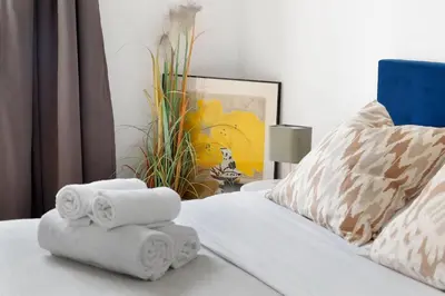 Un ou plusieurs lits dans un hébergement de l'établissement Serenty - Le Marais Studio - Place des Vosges