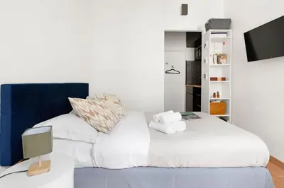Un ou plusieurs lits dans un hébergement de l'établissement Serenty - Le Marais Studio - Place des Vosges