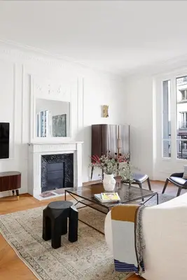 Télévision ou salle de divertissement dans l'établissement Suite Mendes, Appartement de Prestige parisien