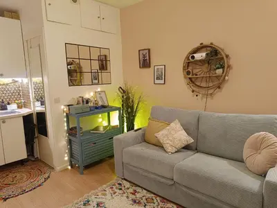 Coin salon dans l'établissement Petit nid douillet à Paris