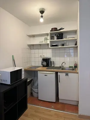 Cuisine ou kitchenette dans l'établissement Apartamento en paris