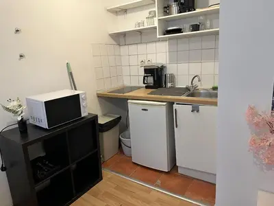 Cuisine ou kitchenette dans l'établissement Apartamento en paris