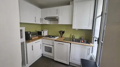 Cuisine ou kitchenette dans l'établissement Chez Roméo