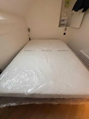 Un ou plusieurs lits dans un hébergement de l'établissement Charming Studio 2P - Marais