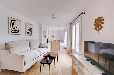 Coin salon dans l'établissement Cozy Studio 2P - Hôtel de Ville