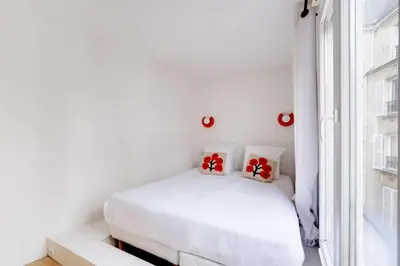 Un ou plusieurs lits dans un hébergement de l'établissement Cozy Studio 2P - Hôtel de Ville
