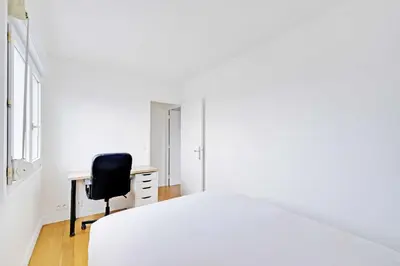 Un ou plusieurs lits dans un hébergement de l'établissement Charming Apartment 1BR 2P - Paris 12